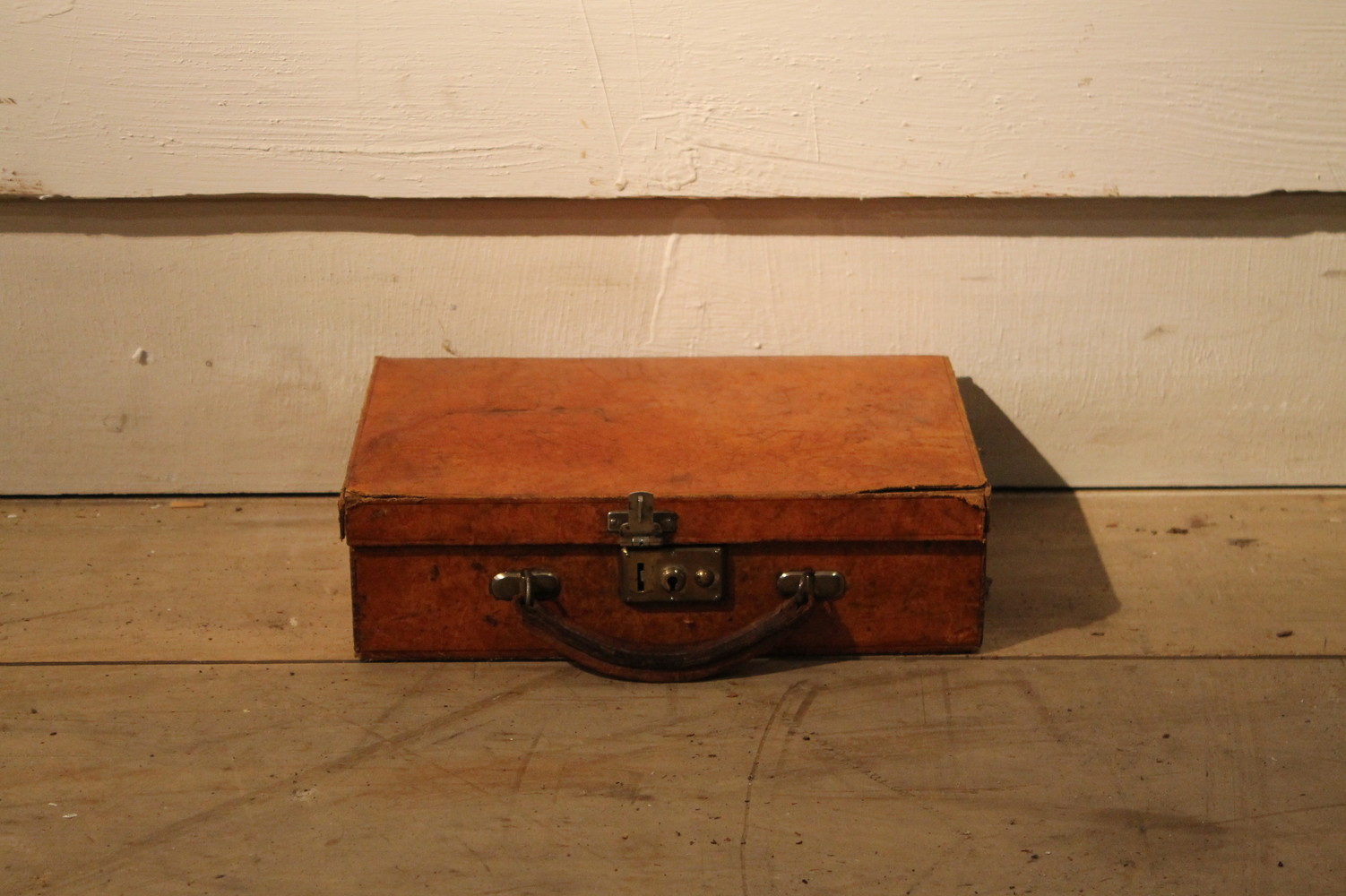 small leather suitcase